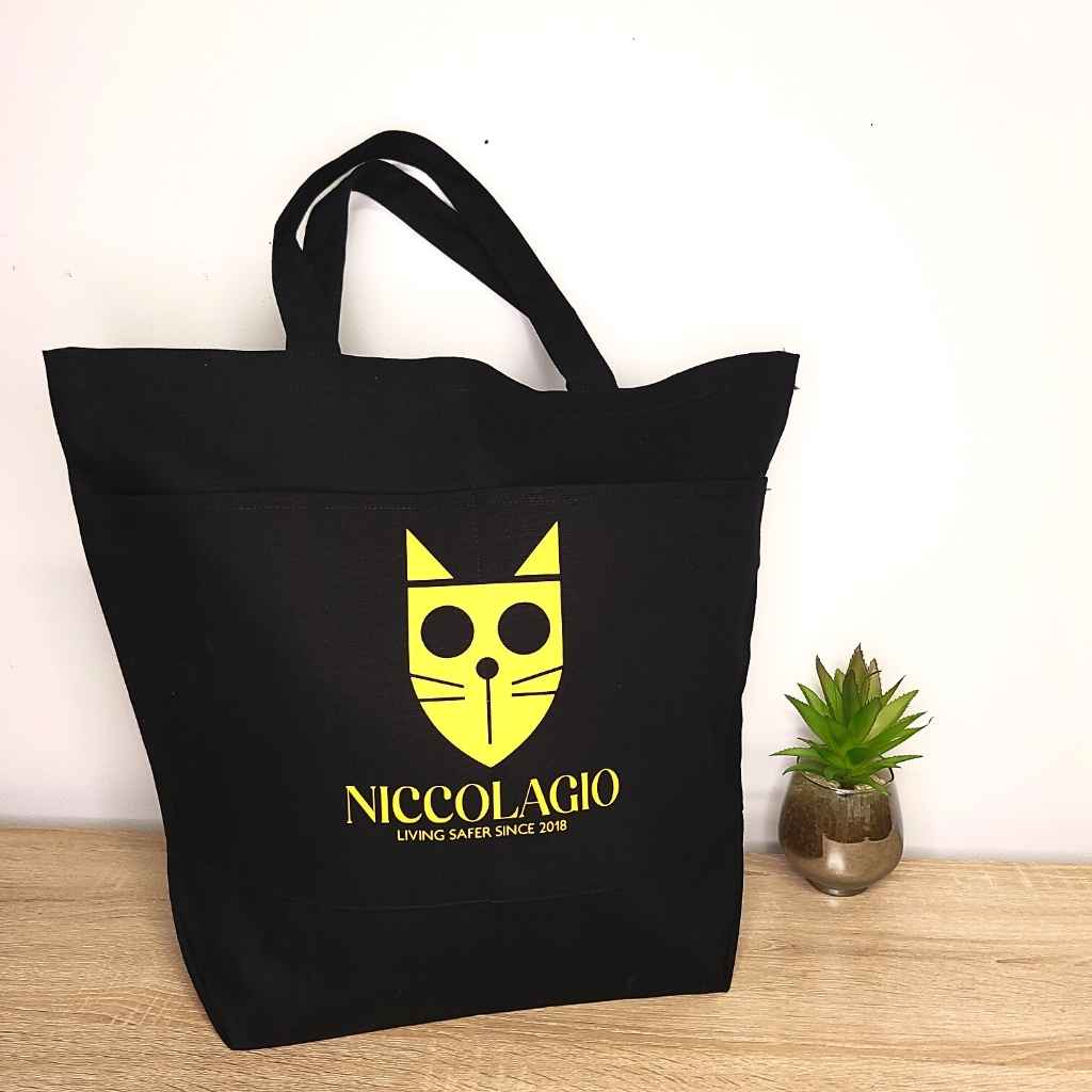 black and yellow tote bag with pockets